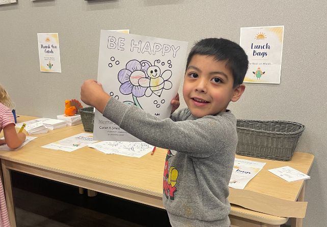 http://New%20Horizon%20Academy%20preschool%20child%20coloring%20a%20worksheet%20for%20Color%20a%20Smile%20organization%20for%20Caring%20Beyond%20the%20Classroom